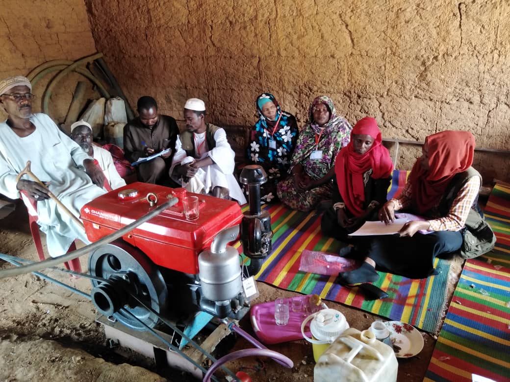 Distribution of Grain (Sorghum/Millet) to the Women's Committee in Hila Keneen, Kutum